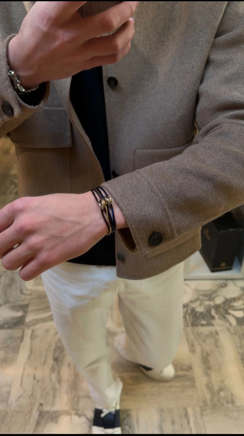 Minimal bracelet styled with modern accessories